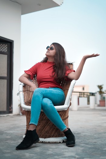 Woman Sitting on Chair