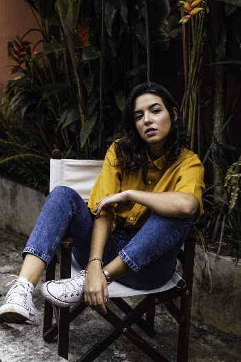 Woman Sitting on Chair