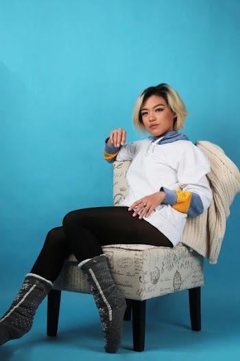 Woman Sitting on Chair
