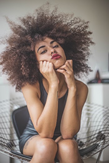 Woman Sitting on Chair