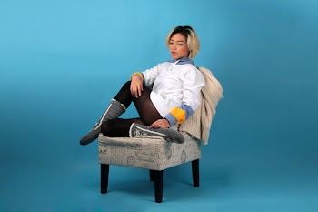 Woman Sitting on Chair