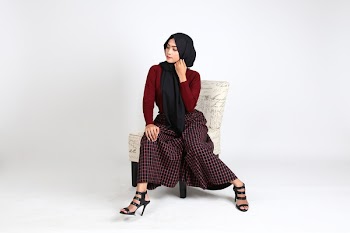 Woman Sitting on Chair