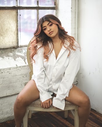 Woman Sitting on Chair
