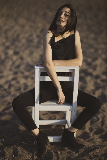 Woman Sitting on Chair