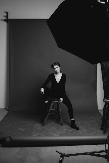 Woman Sitting on Chair