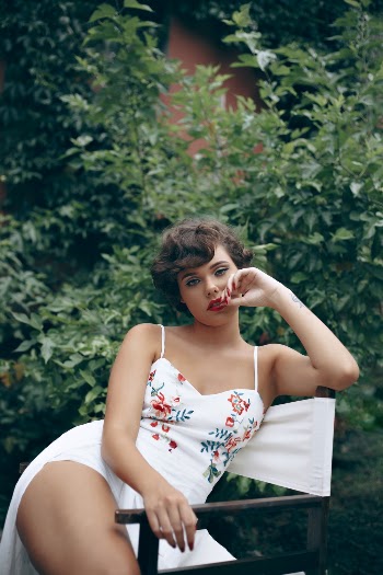 Woman Sitting on Chair