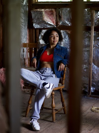 Woman Sitting On Chair
