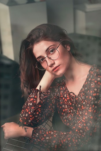 Woman Sitting on Chair