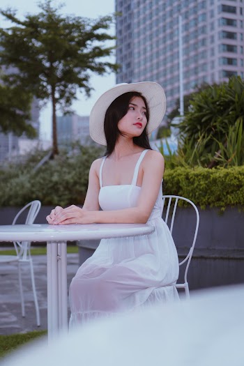 Woman Sitting on Chair