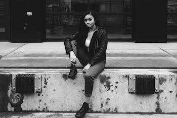Woman Sitting on Concrete