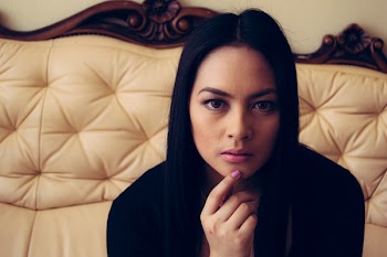Woman Sitting on Couch