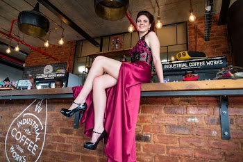 Woman Sitting on Counter Top