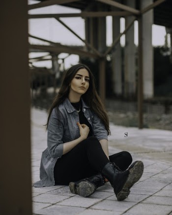 Woman Sitting on Floor