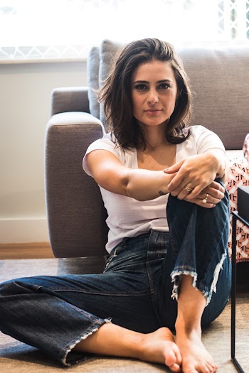 Woman Sitting on Floor