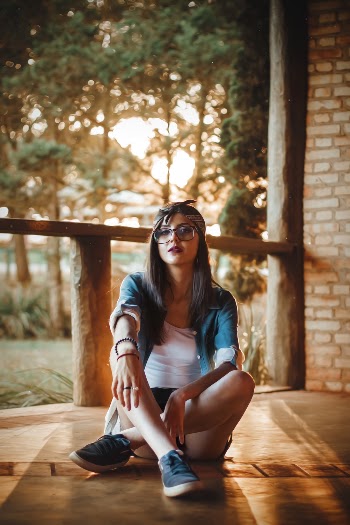 Woman Sitting on Floor
