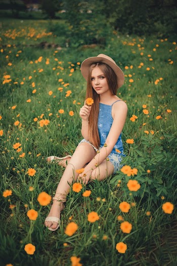 Woman Sitting on Grass