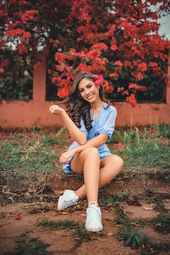 Woman Sitting on Grass