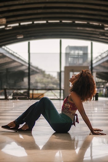 Woman Sitting On Ground
