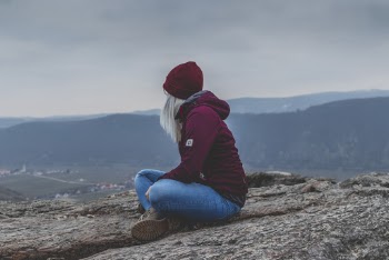 Woman Sitting On Ground