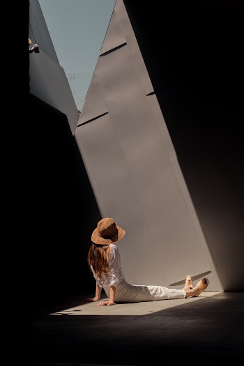 Woman Sitting on Ground