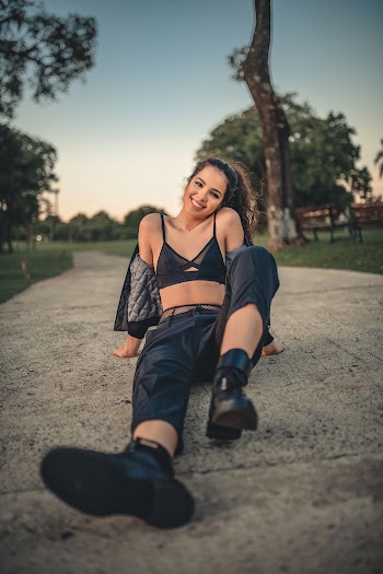 Woman Sitting on Ground