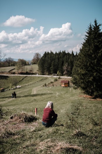 Woman Sitting on Ground