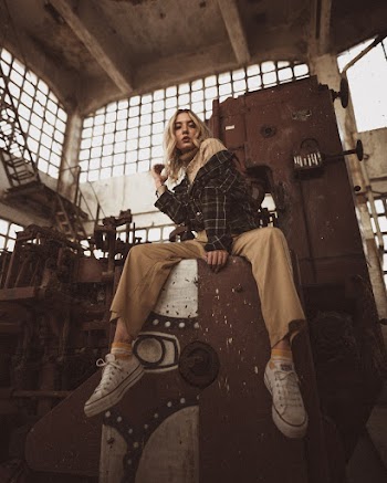 Woman Sitting on Machine