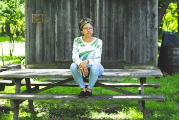 Woman Sitting on Picnic Bench