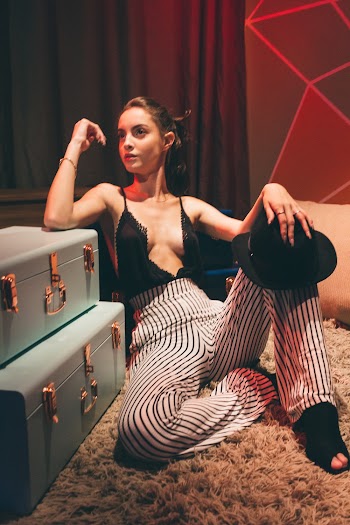 Woman Sitting on Rug