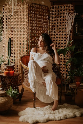 Woman Sitting on Sofa Chair