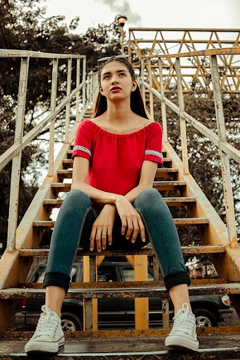 Woman Sitting on Stair