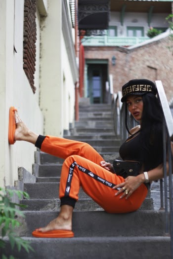 Woman Sitting on Stairs