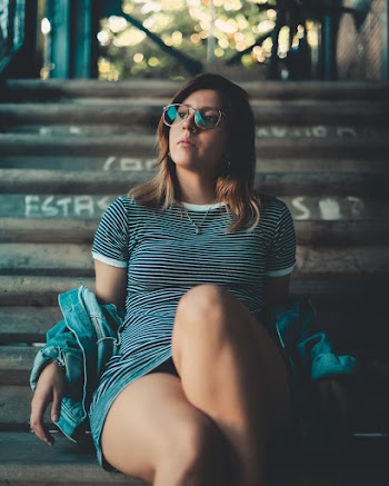 Woman Sitting on Stairs