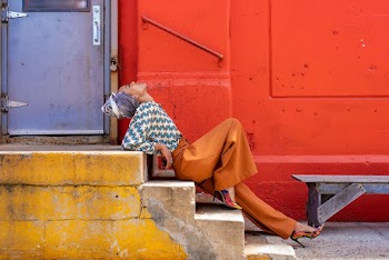 Woman Sitting on Stairs