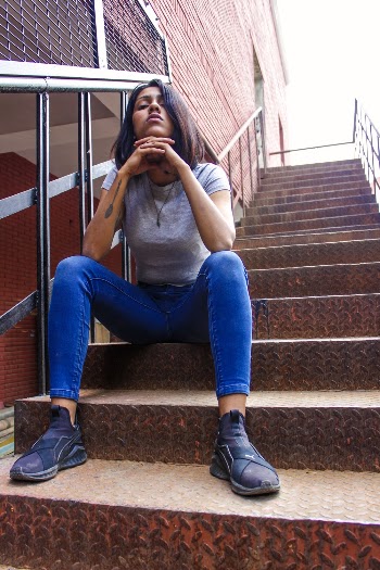 Woman Sitting On Stairs