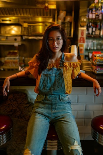 Woman Sitting on Stool Indoor
