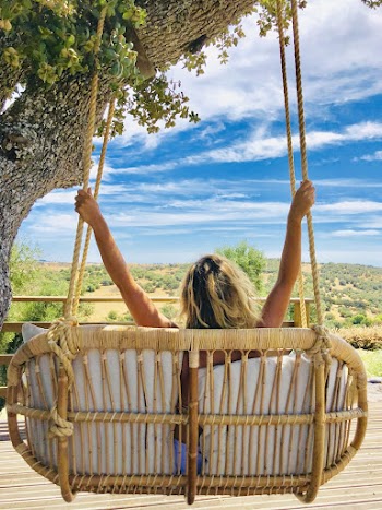Woman Sitting on Swing Seat