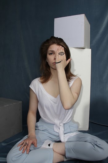 woman sitting on the floor