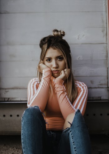 Woman Sitting On The Floor 