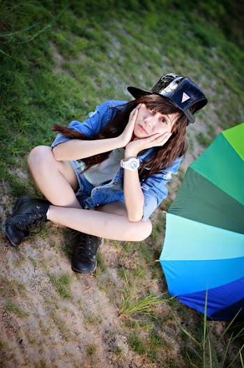 Woman Sitting on the Ground