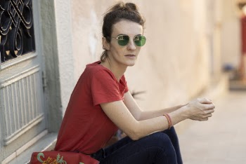 Woman Sitting on the Street