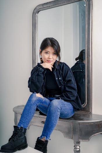 Woman Sitting on Vanity Table
