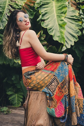 Woman Sitting on Wood Log