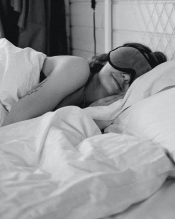 Woman Sleeping in Bed with Sleeping Mask on · Free Stock Photo