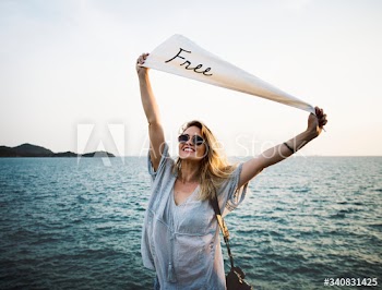 Woman smiling and chill out by the sea