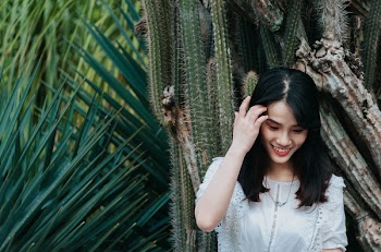Woman Smiling Looking Downward