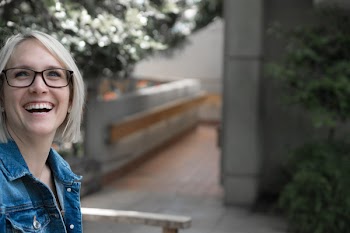 Woman Smiling While Looking Upwards