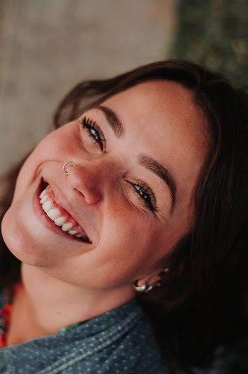 Woman Smiling With Nose Piercing