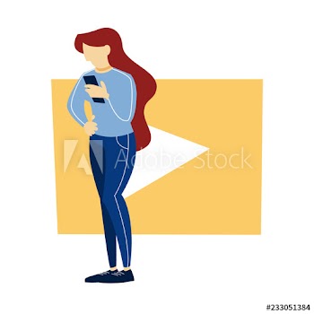 Woman standing at a video sign