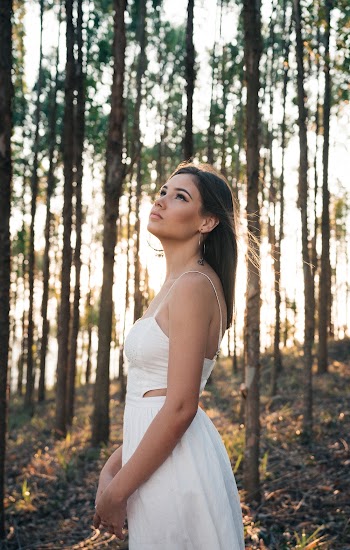 Woman Standing at Forest